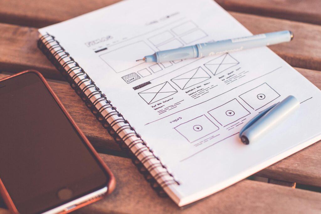a notebook showcasing ideas and reasons to rebuild a website from the ground up